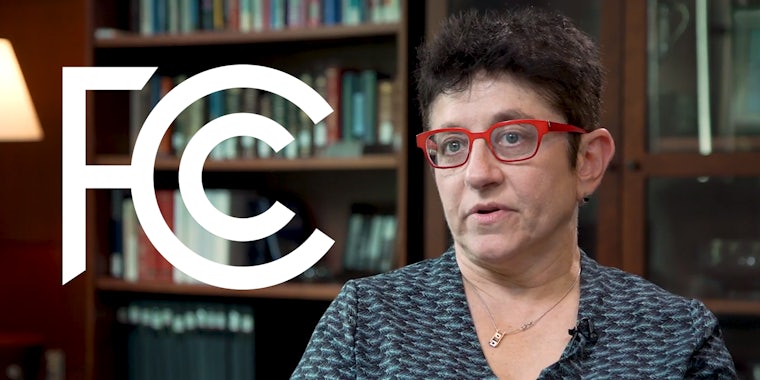 Gigi Sohn speaking in front of bookshelf with FCC logo to her left